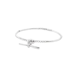 Sterling silver T bar charm bracelet displayed on plain white background